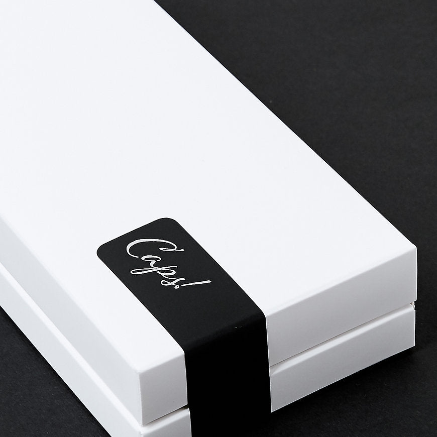 caps, šokolāde, korporatīvās dāvanas, trifeles, šokolādes, tastecaps, caps chocolate, taste caps, caps!, caps šokolāde, šokolādes dāvanas, caps konfektes, ekskluzīva šokolāde, caps! Chocolate, šokolādes trifeļu kolekcija, tastecaps.lv, personalizētas biznesa dāvanas, šokolādes trifeles, idejas dāvanai, šokolādes konfektes